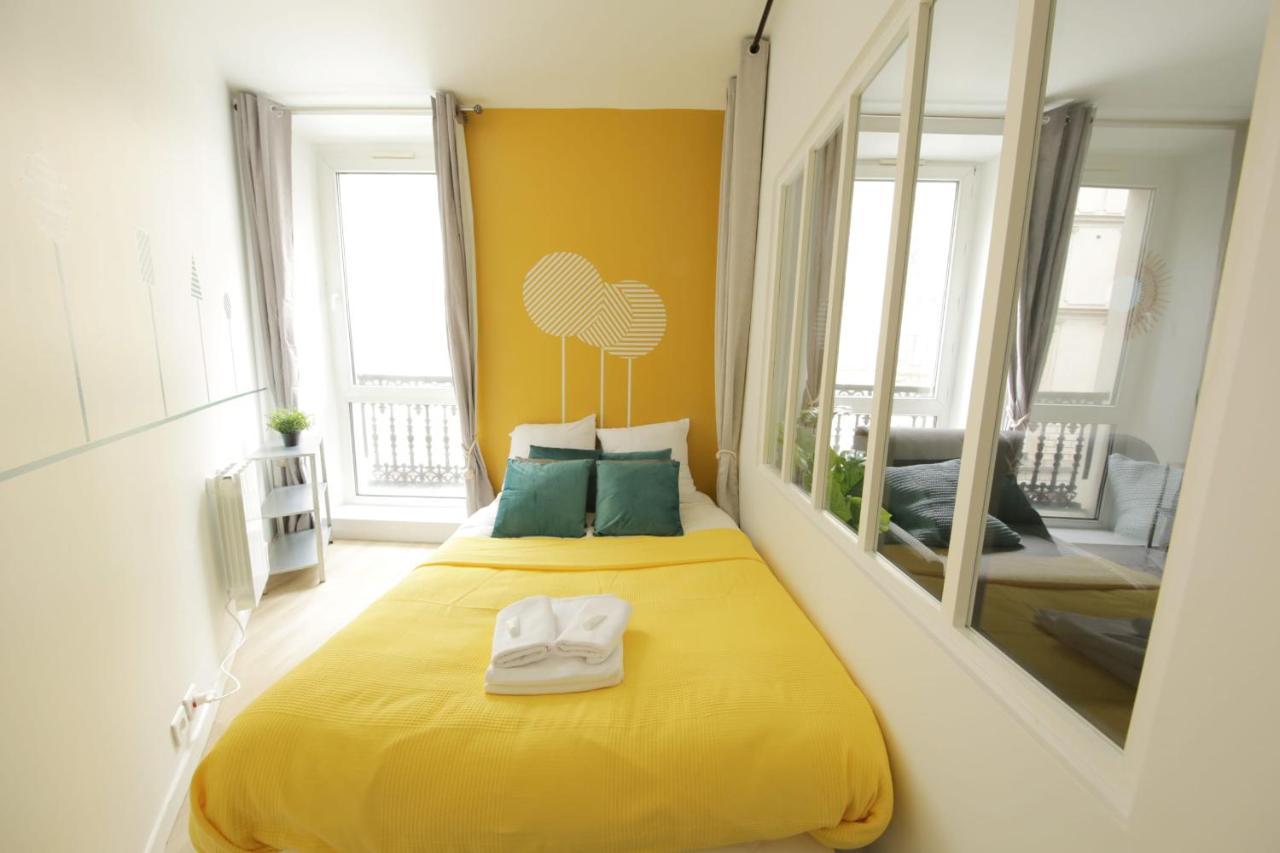 Green Apartment Near Montmartre And Opera Paris Bagian luar foto