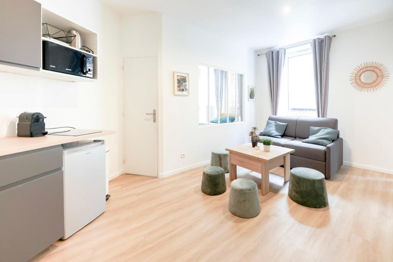 Green Apartment Near Montmartre And Opera Paris Bagian luar foto