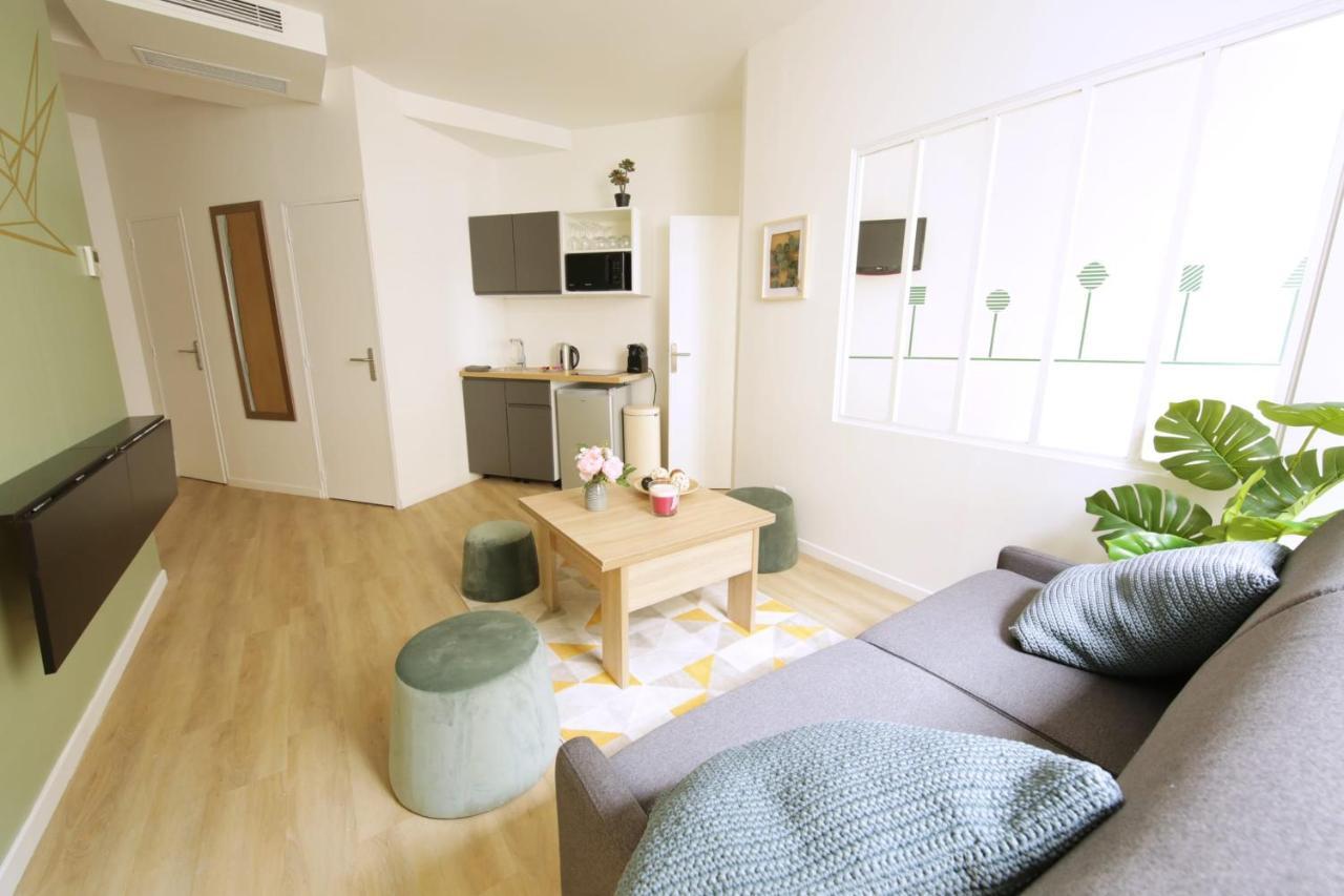 Green Apartment Near Montmartre And Opera Paris Bagian luar foto